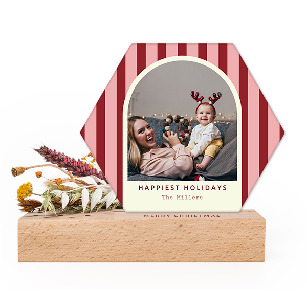 Wooden block with print, dried flowers and hexagonal forex card