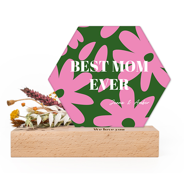 Wooden block with print, dried flowers and hexagonal forex card