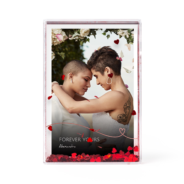 Photo frame with heart confetti