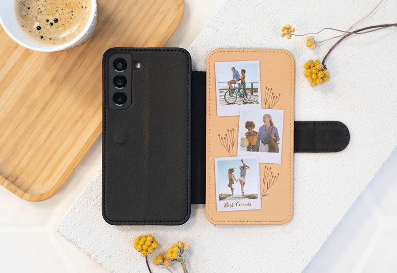 Black Samsung wallet case with personalised tan interior featuring three photo slots and 'Best Friends' text.