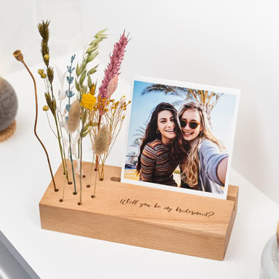 Fotoprints met bloemen in designhouder