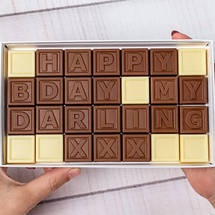 Choklad med text 28 bitar